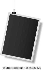Photo frame hanging with binder clip isolated on white background is creating a vintage memories template with empty black space for your design
