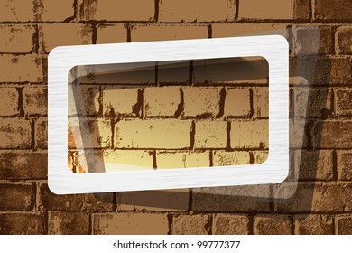 Photo frame on the brick wall