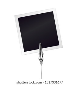 Photo Frame On A Metal Memo Holder Clip. Photo On Wire Silver Clamps Over White Background. Photo Album. Vector Illustration