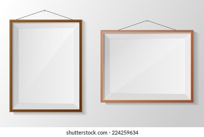 Photo frame on white wall. Vector
