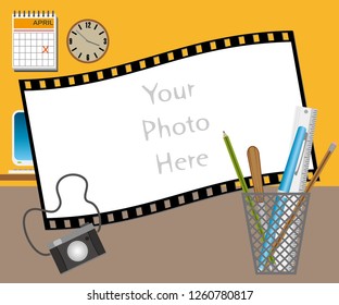 Photo frame with some stationery in the pen holder