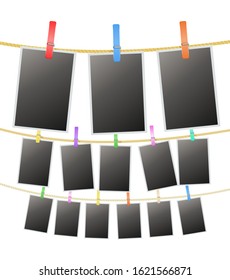 Photo frames hanging on rope with clothespins, blank space template for Your photographs.