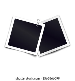 Photo frames with metal paper clip. Metal paper clip attached to two retro photorealistic photo frames on white background. Template for design. Vector illustration
