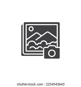 Photo glyph vector icon. Camera and picture graphic