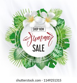 Photo realistic palm leaves, plumeria flower and handwriting lettering text Summer, Sale, shop now on a light round banner. Poster for promotions, magazines, advertising.