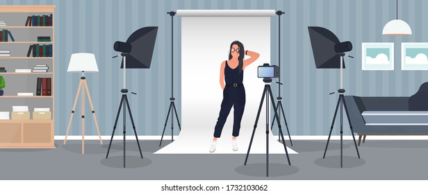 Photo Studio Vector. Girl posing to the camera. White canvas background on tripods. Camera on a tripod, softbox. Professional photo studio.