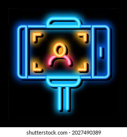 photo using selfie stick neon light sign vector. Glowing bright icon photo using selfie stick sign. transparent symbol illustration
