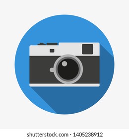 Photocamera flat icon with dropshadow, blue background. Vintage camera, photoalbum, image, picture. Flat design, simple, vector illustration.