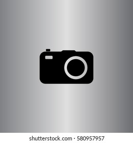 Photocamera icon, vector illustration