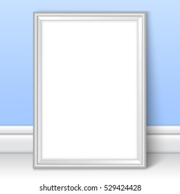Photoframe template near blue wall. Realistic mockup vector. Silver framing great for kids drawing, painting or photo. Picture template for children room or school theme design.