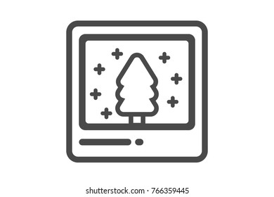 photograph of a Christmas tree with snowflakes