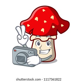 Photographer amanita mushroom mascot cartoon