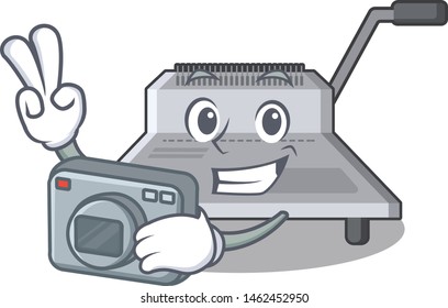 Photographer binding machine above wood table cartoon