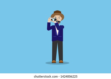 Photographer or camera man standing in action of taking photo by the blue suit with camera and wearing brown hat on blue background