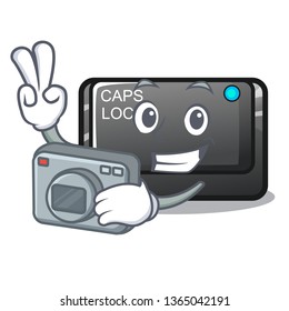 Photographer capslock button attached to mascot keyboard