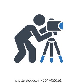 Um fotógrafo capturando uma imagem com um ícone de câmeraName