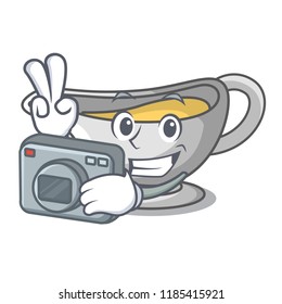 Photographer cartoon sauce boat with turkey gravy