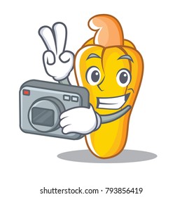 Photographer cashew mascot cartoon style