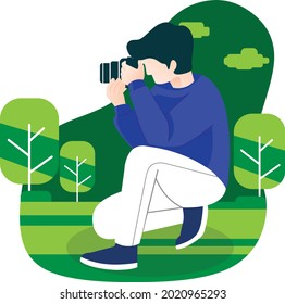 Photographer clicking photo of landscape