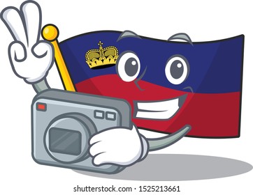 Photographer flag liechtenstein folded above mascot table