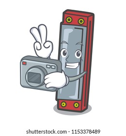 Photographer harmonica mascot cartoon style