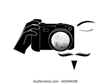 photographer logo. Silhouette of a man with a mustache and beard, camera with a landscape reflection in the lens
