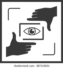 Photographer looking at you through hand frame. Nice frame made from fingers and eye inside. Black variation of vector illustration of perspective view.
