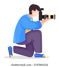 Photographer or paparazzi kneel to take best photo using professional high resolution camera with removable lens. Man shooting, using professional equipment. Cartoon character at white background