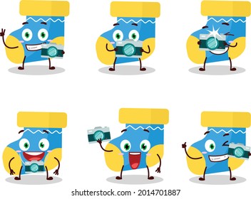 Photographer profession emoticon with baby blue socks cartoon character. Vector illustration