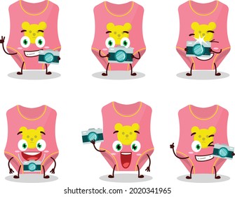 Photographer profession emoticon with baby swimsuit cartoon character. Vector illustration