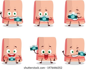 Photographer profession emoticon with towel cartoon character