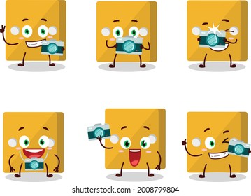 Photographer profession emoticon with yellow dice cartoon character. Vector illustration