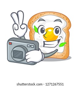 Photographer sandwich with egg above character board