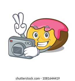 Photographer swiss roll mascot cartoon