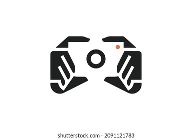 Photographer Symbol Design. Vector Logo Template. A smart logomark of two hands holding a DSLR camera in a negative effect. An emblem representing quality portrait, nature, wedding and other photograp