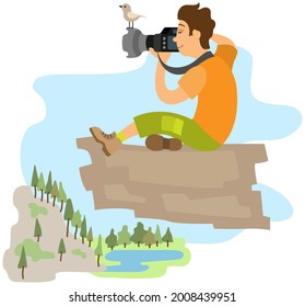 Photographer taking picture of landscape. Man holding digital camera with powerful zoom lens. Photo of mountain and river on camera. Male character is taking pictures of nature from high rock