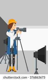 Photographer working with camera on a tripod.
