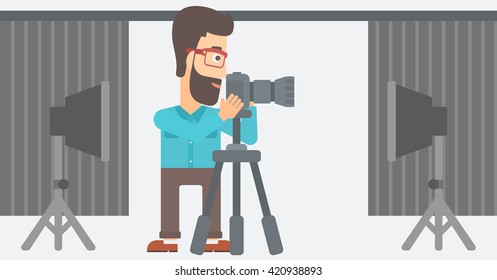 Fotógrafo trabajando con cámara en un trípode.