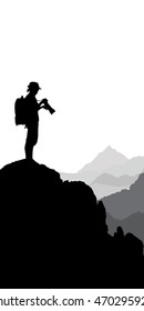Photographer working in the mountains