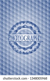 Photography blue emblem with geometric pattern background.