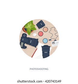 Photography equipment with photo camera on a table.Vector illustration in a flat style.Photography tools, photo editing.Digital photography art with single lens reflex photo camera.Photographer.
