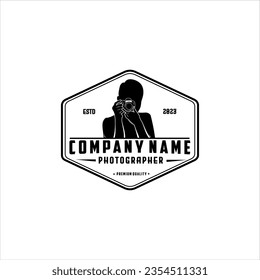 Photography logo design with an illustration of a professional person taking a picture