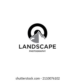 Photography logo design with mountain landscape and lens vector for photographer