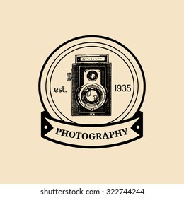 Photography logo. Vector vintage old camera label, badge, emblem. Hand sketched illustration for studio, store etc.