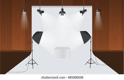 Photography studio with lighting equipment and backdrop. Illustrated vector. Display mock-up. Box in the middle for your object design. Photo studio with wood wall and light beam.