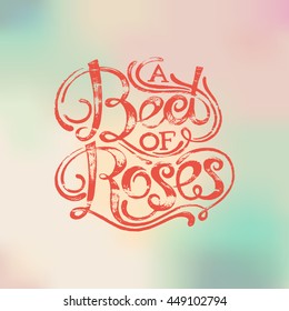 The phrase "A bed of roses". Red stamping on a color background. Vector illustration lettering. Designed for wedding invitations, print on T-shirts.