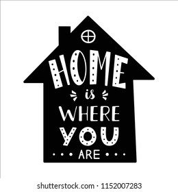 Phrase Home is where you are. Hand drawn lettering in the shape of house. Inspirational quote. 