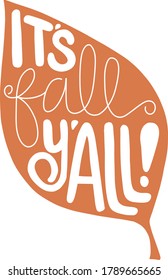 The phrase "It's fall y'all!" hand written in the shape of a leaf