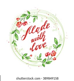 phrase made with love written by hand in watercolor floral frame