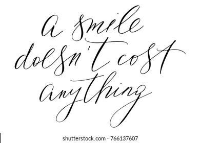 Phrase a smile doesn't cost anything handwritten text vector.